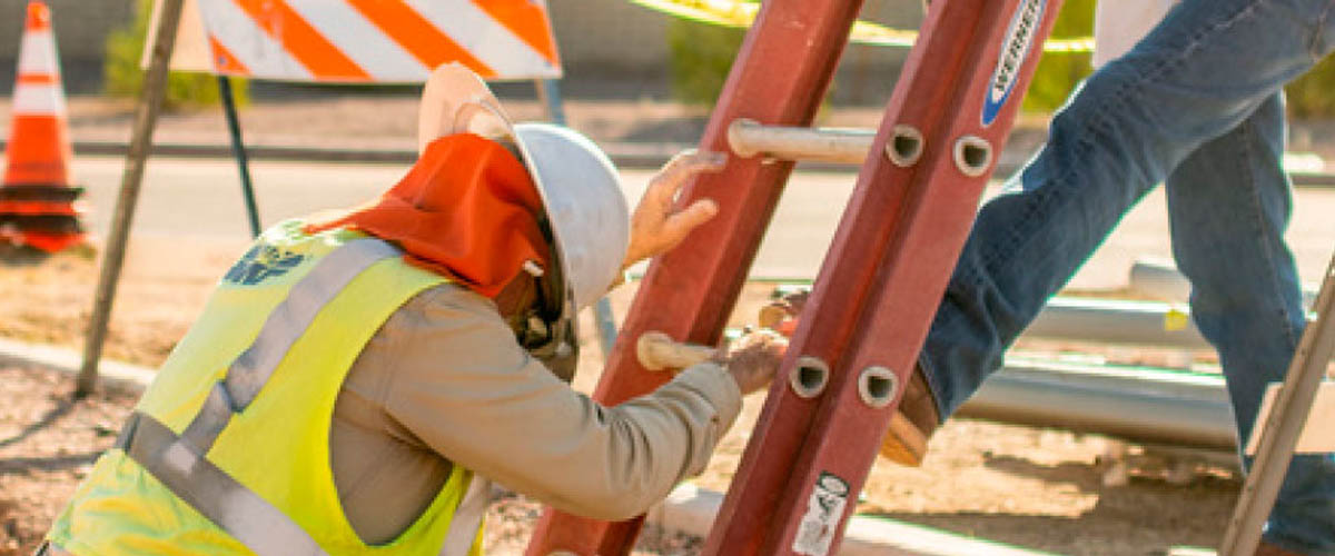 Construction workers are on the job at a site in Greater Phoenix, a business-friendly environment free from overly restrictive regulations.