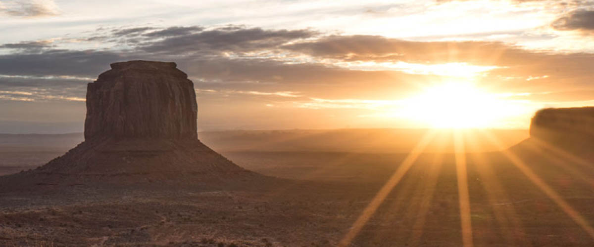 A stunning view of the towering sandstone rock formations in Monument Valley Navajo Tribal Park.