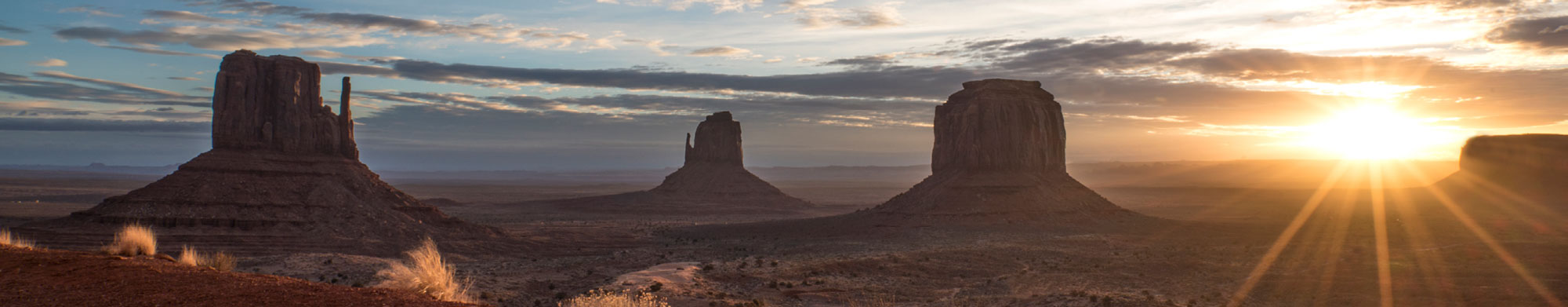 A stunning view of the towering sandstone rock formations in Monument Valley Navajo Tribal Park.